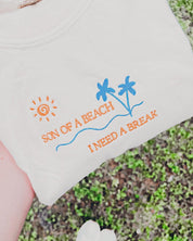 Punny Beach Embroidered Lux Tee